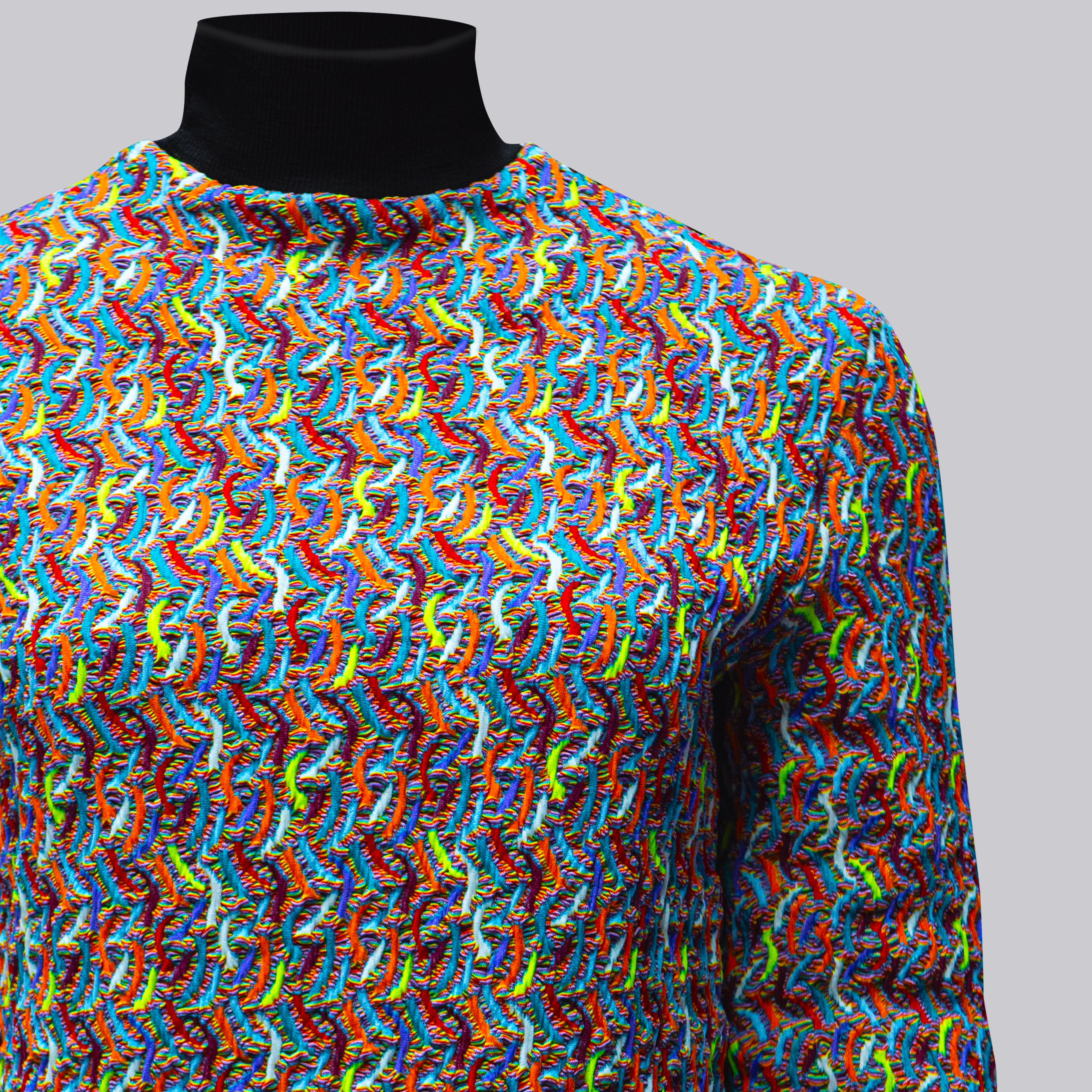 Dettaglio maglione con tessuto M3TATEX